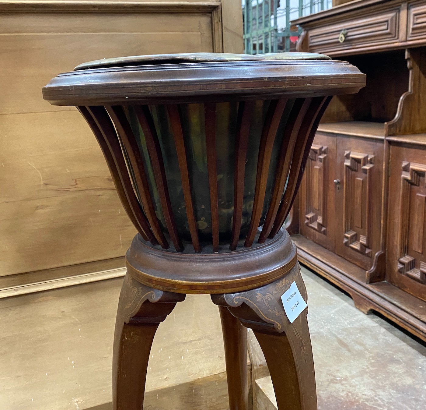 An Edwardian inlaid mahogany jardiniere with brass liner, height 93cm